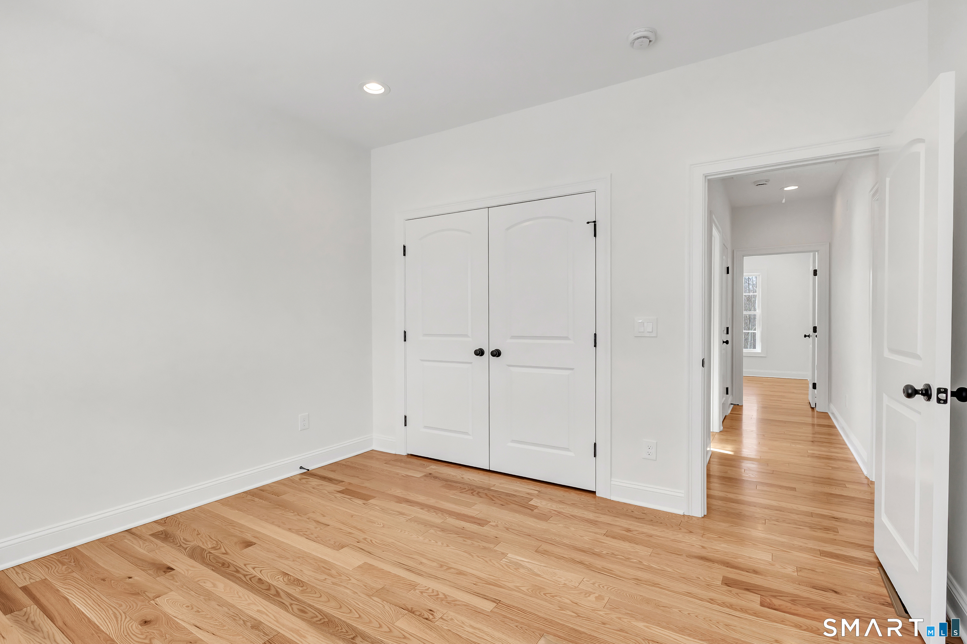 15 Hunting Ridge Road Middlebury, CT 06762 - Photo 37 of 41 a view of a room with wooden floor