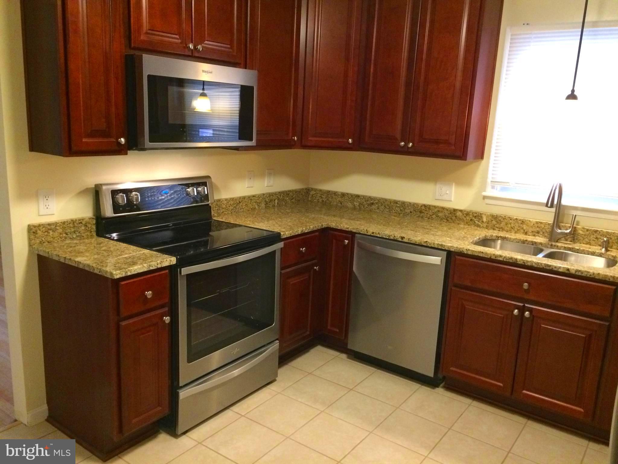 720 West Watersville Road Mount Airy, MD 21771 - Photo 11 of 30 Kitchen with new Whirlpool stainless appliances