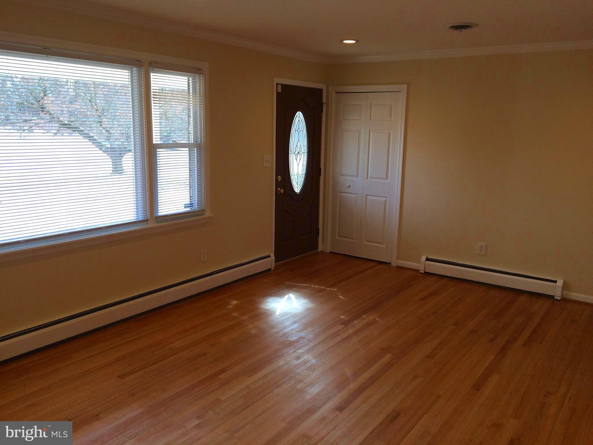 720 West Watersville Road Mount Airy, MD 21771 - Photo 7 of 30 Living room with refinished hardwood floors