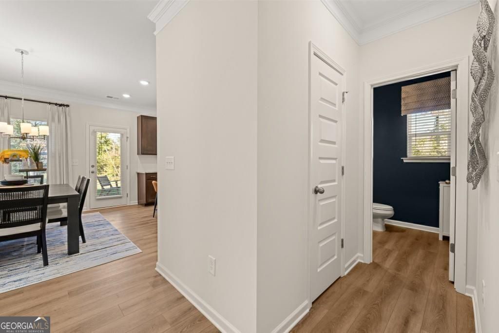 202 Sycamore Lane Calhoun, GA 30701 - Photo 20 of 48 a view of a hallway with wooden floor windows and a livingroom