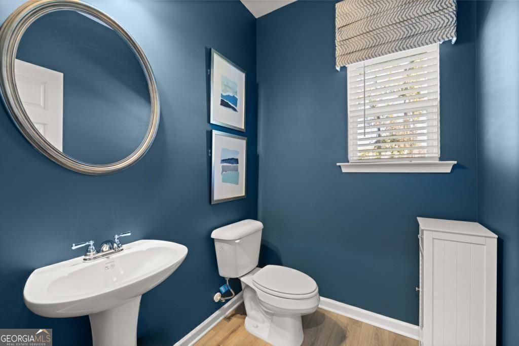 202 Sycamore Lane Calhoun, GA 30701 - Photo 21 of 48 a bathroom with a toilet sink and mirror