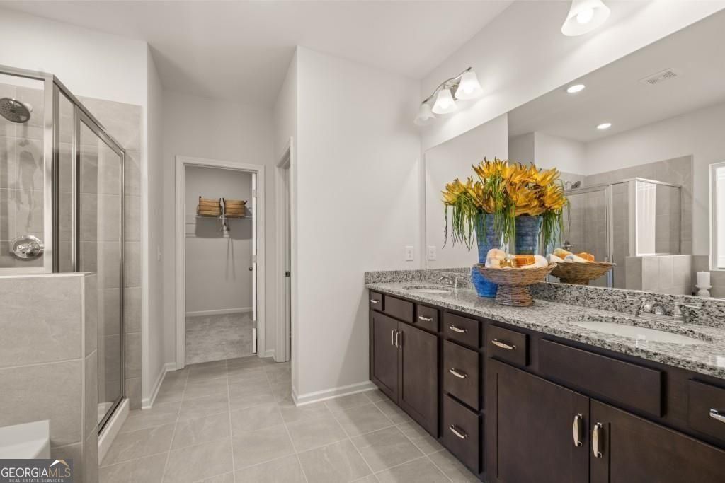 202 Sycamore Lane Calhoun, GA 30701 - Photo 29 of 48 a bathroom with a granite countertop sink and a mirror