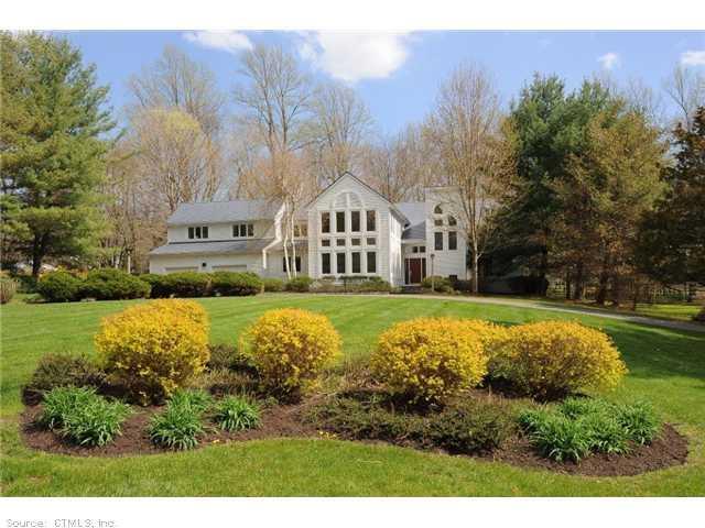 4 Homewood Road Woodbridge, CT 06525 - Photo 1 of 1 a house with garden in front of it