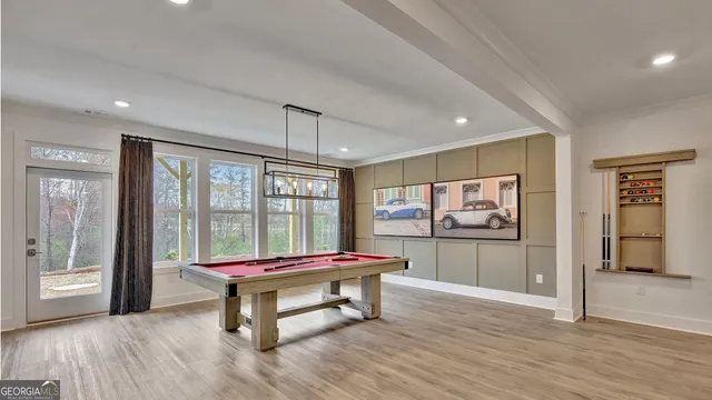 a view of a dining room with furniture window and outside view