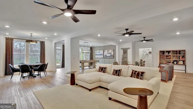 a view of a dining room with furniture window and outside view