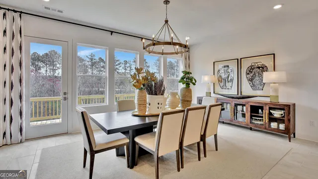 a living room with furniture and a book shelf