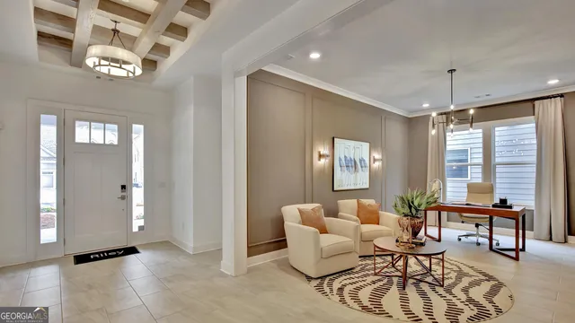 a view of living room with furniture and a window