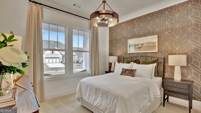 a view of a brick house with many windows