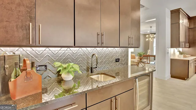 a spacious bathroom with a double vanity sink a mirror and shower