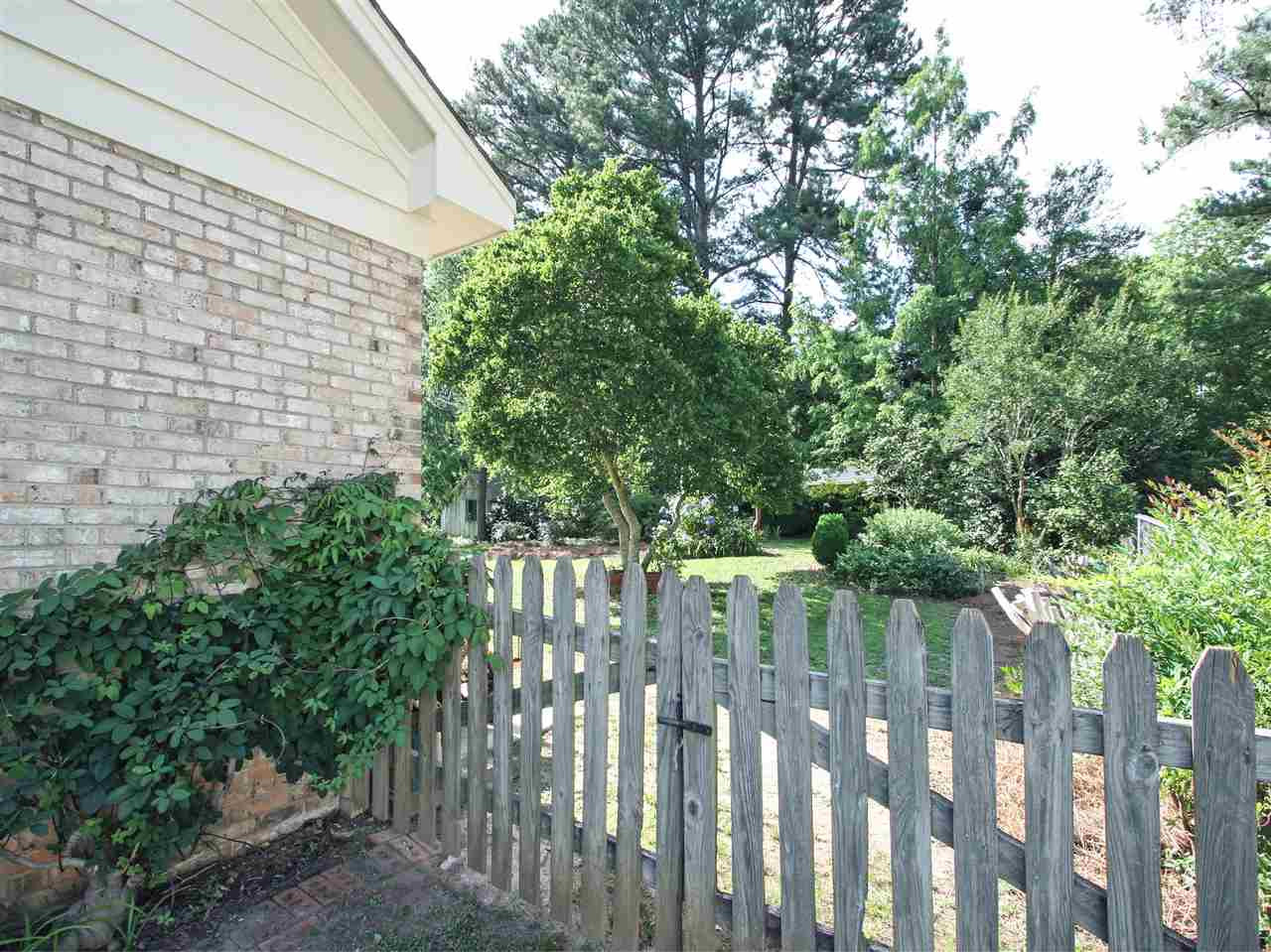 1324 Kingston Ridge Road Cary, NC 27511 - Photo 24 of 30 Backyard is huge and is fully fenced--a great space for play or pets, a vegetable or herb garden, flower garden, or just as a quiet spot to relax. Fenced backyard