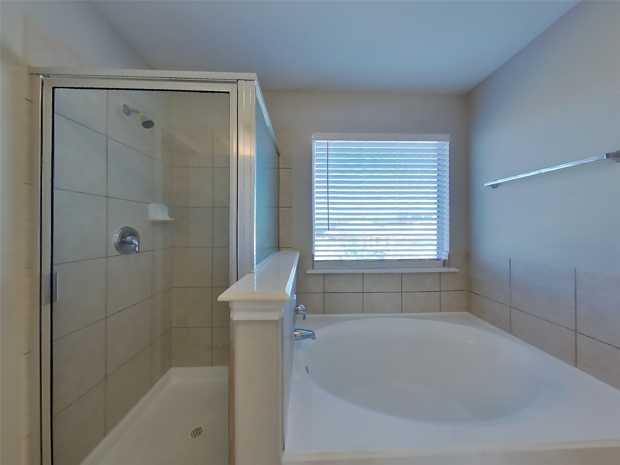 1910 Flycaster Drive Spring, TX 77388 - Photo 12 of 19 a bathroom with a bathtub and shower