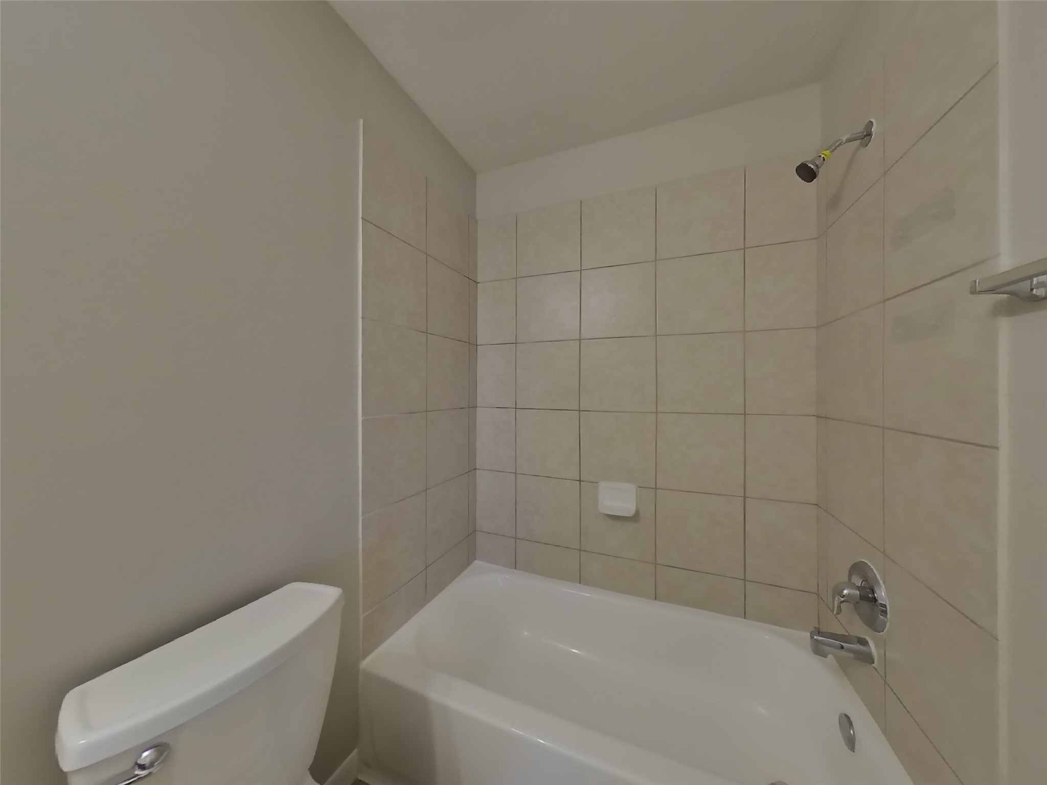 1910 Flycaster Drive Spring, TX 77388 - Photo 17 of 19 a bathroom with a bathtub and toilet