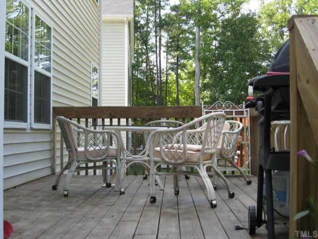 3521 Weir Way Raleigh, NC 27616 - Photo 12 of 12 spacious oversized deck views out onto flat yard and woods Other