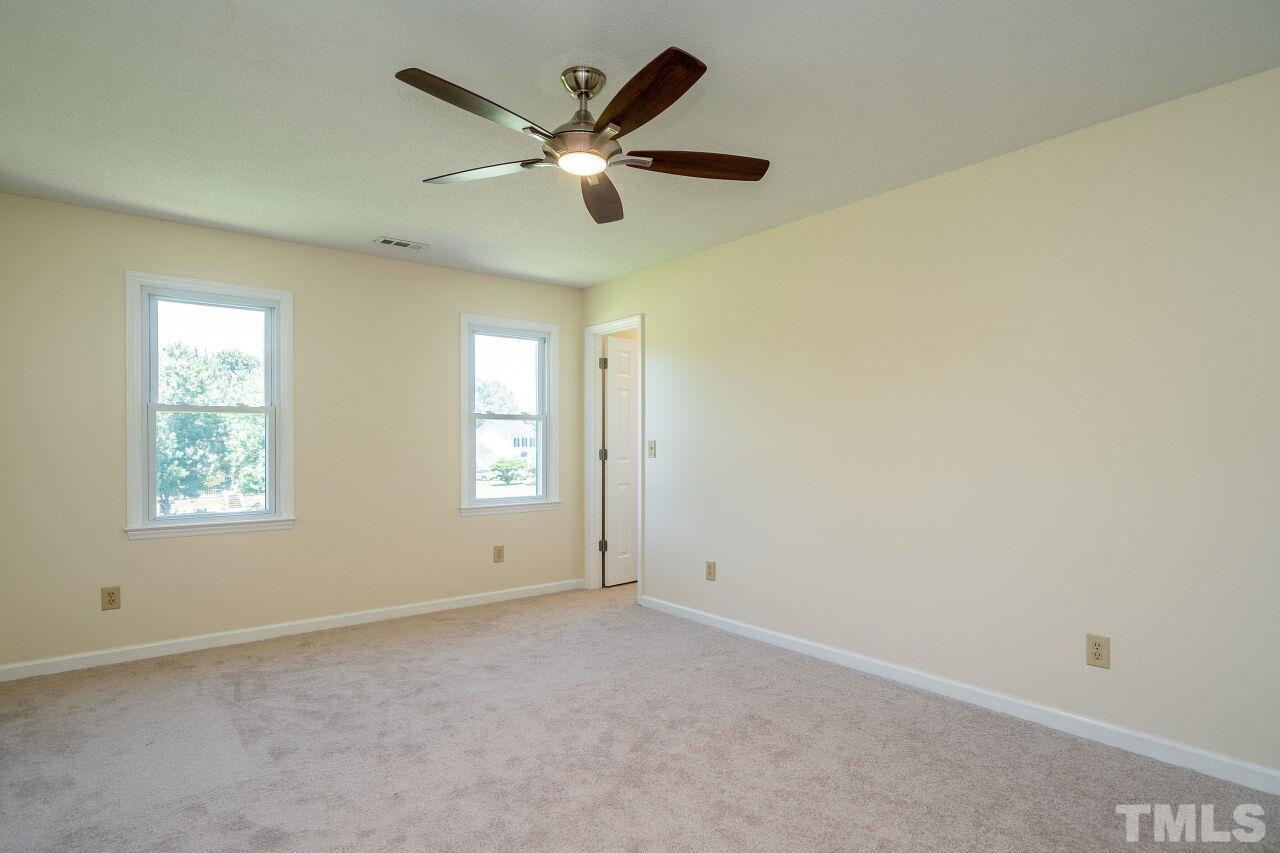 9320 Tallgrass Road Raleigh, NC 27603 - Photo 14 of 28 an empty room with a window