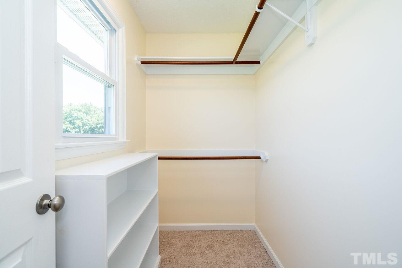 9320 Tallgrass Road Raleigh, NC 27603 - Photo 16 of 28 a view of walk in closet with window
