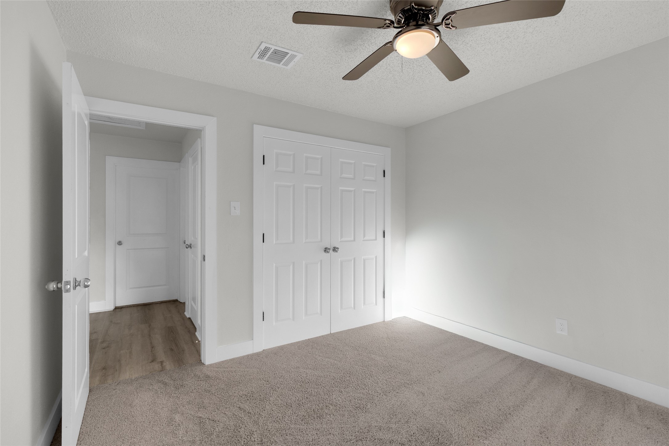 23910 Spring Briar Lane Spring, TX 77373 - Photo 21 of 38 a view of an empty room and chandelier fan