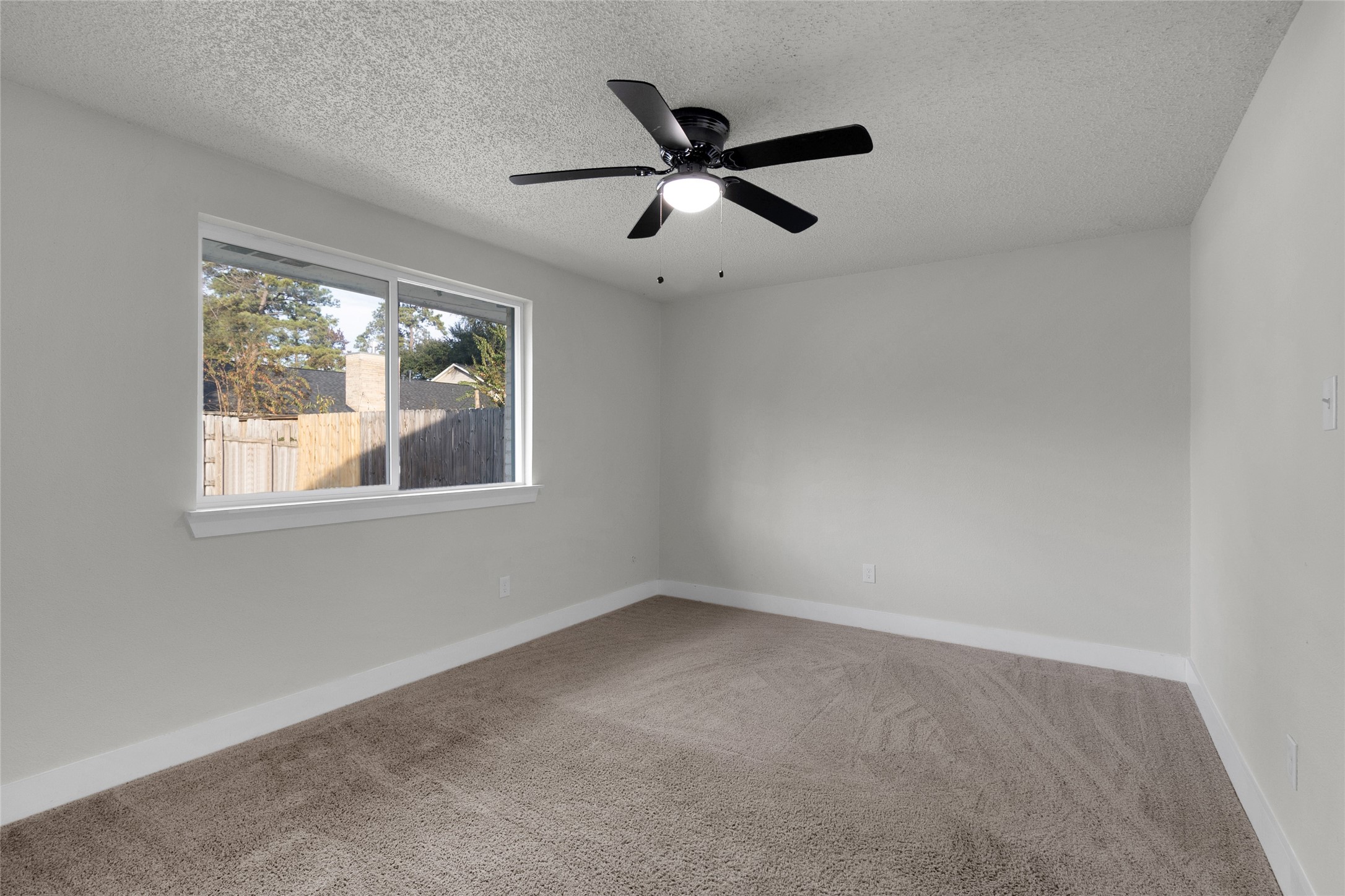 23910 Spring Briar Lane Spring, TX 77373 - Photo 23 of 38 a view of an empty room with a window