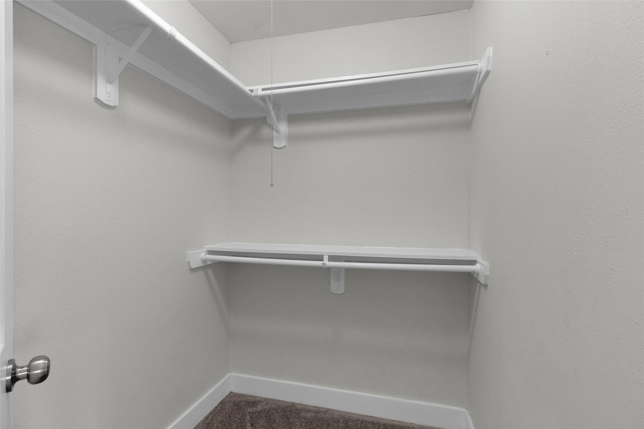 23910 Spring Briar Lane Spring, TX 77373 - Photo 27 of 38 a view of a room with racks on the wall