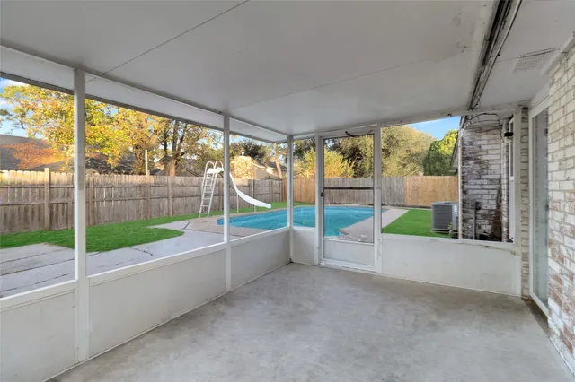 a view of a backyard with green space