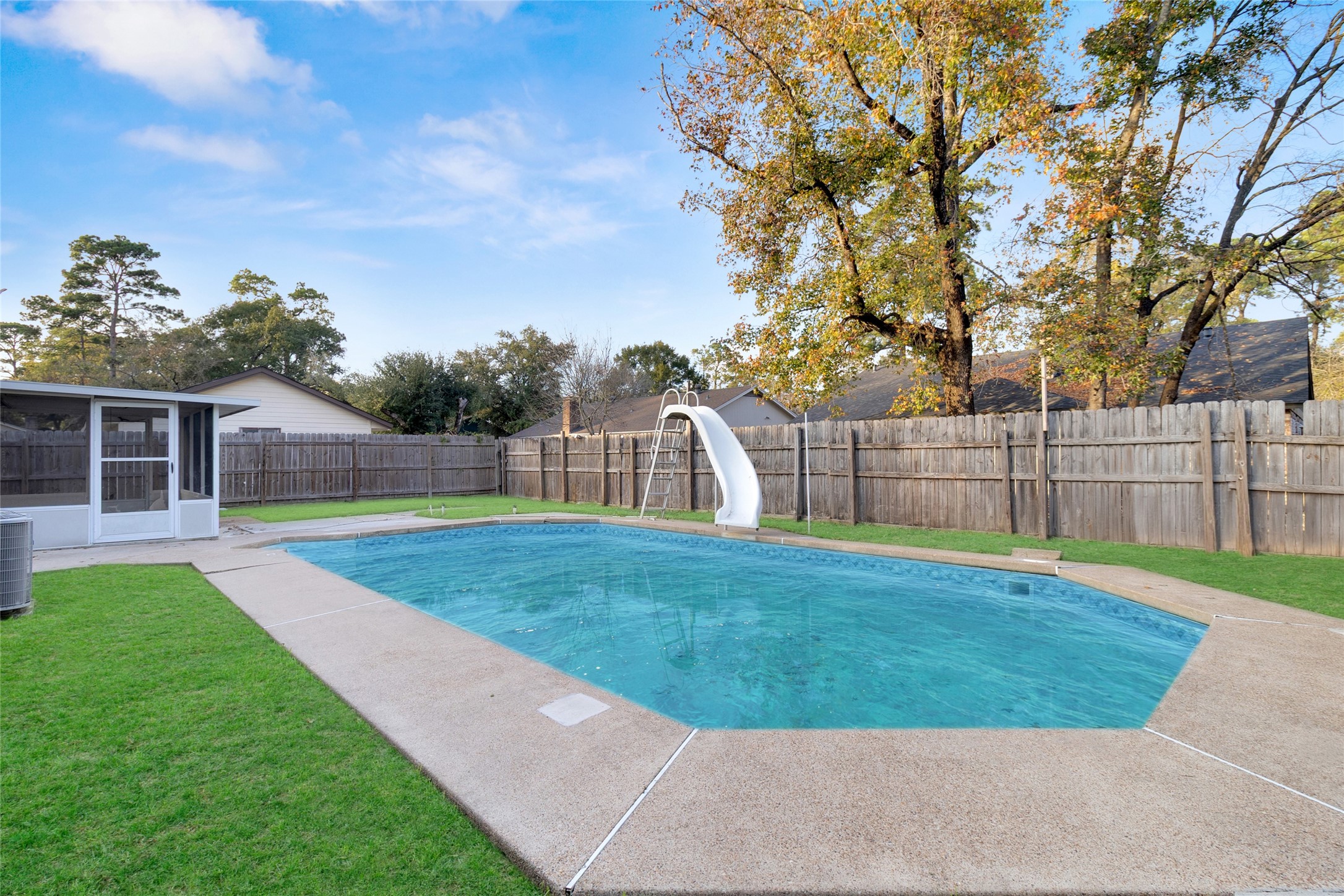 23910 Spring Briar Lane Spring, TX 77373 - Photo 37 of 38 a view of a backyard with large trees and wooden fence