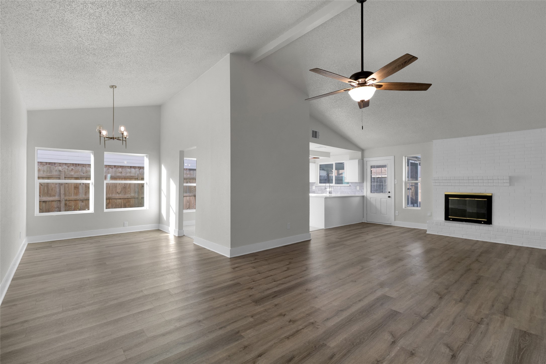 23910 Spring Briar Lane Spring, TX 77373 - Photo 6 of 38 a view of an empty room with wooden floor and a window