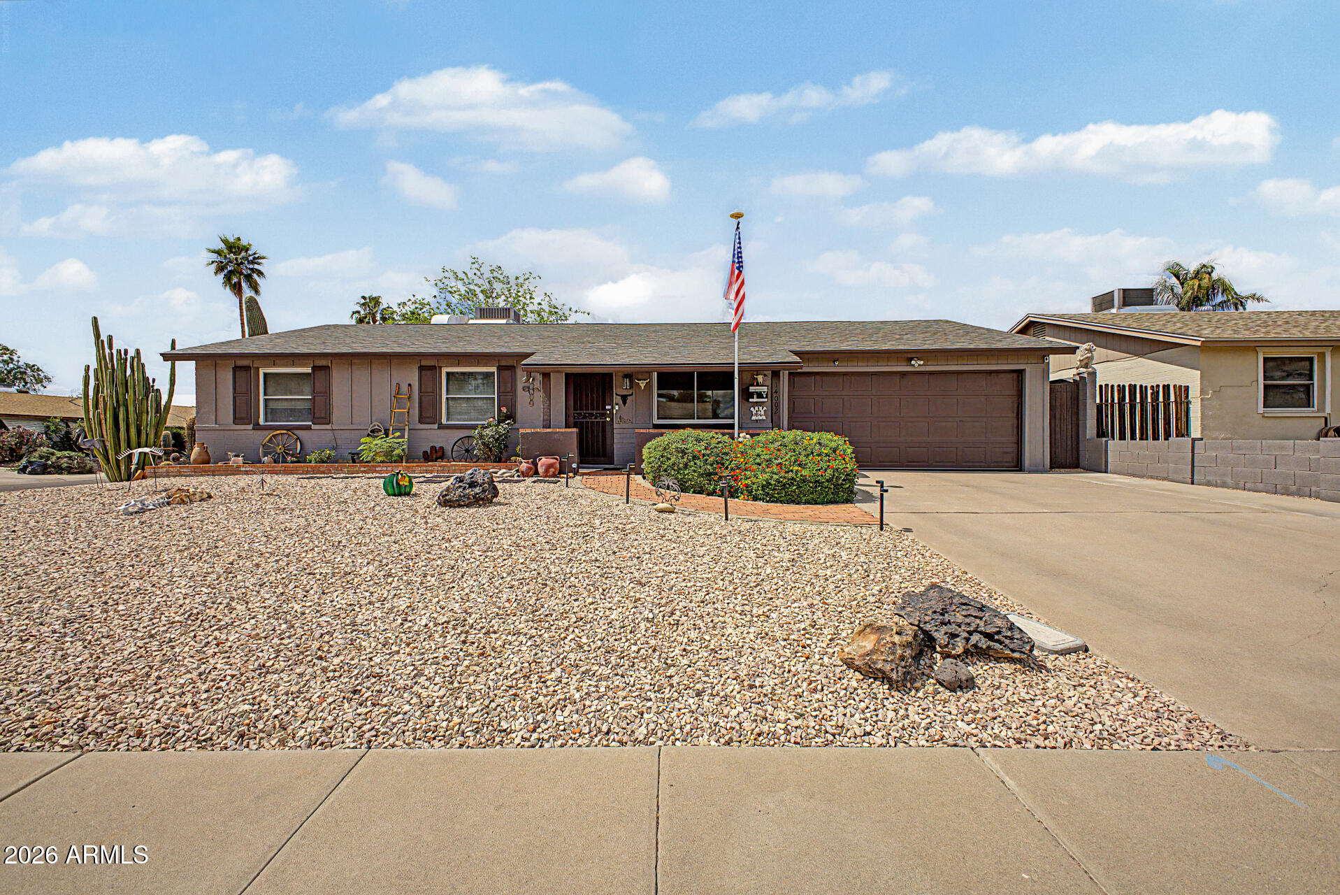 14002 North 37th Place Phoenix, AZ 85032 - Photo 2 of 33 a view of a house with a patio