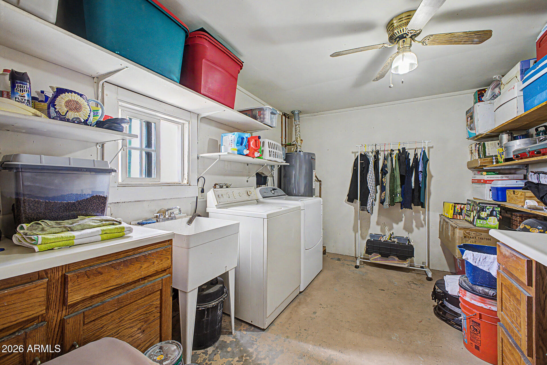 14002 North 37th Place Phoenix, AZ 85032 - Photo 25 of 33 a utility room with storage and utility