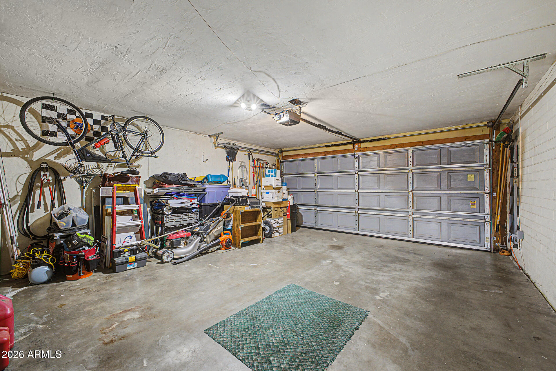 14002 North 37th Place Phoenix, AZ 85032 - Photo 27 of 33 a view of a garage with storage