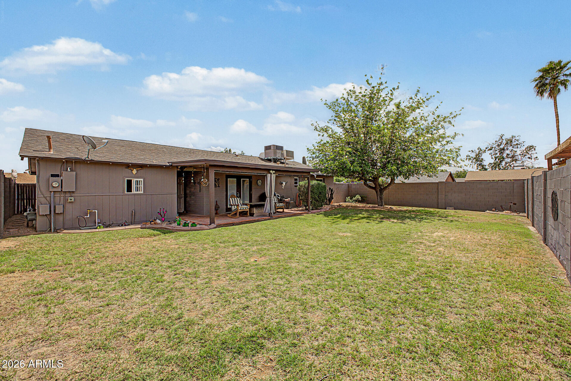 14002 North 37th Place Phoenix, AZ 85032 - Photo 29 of 33 a view of a house with backyard and garden
