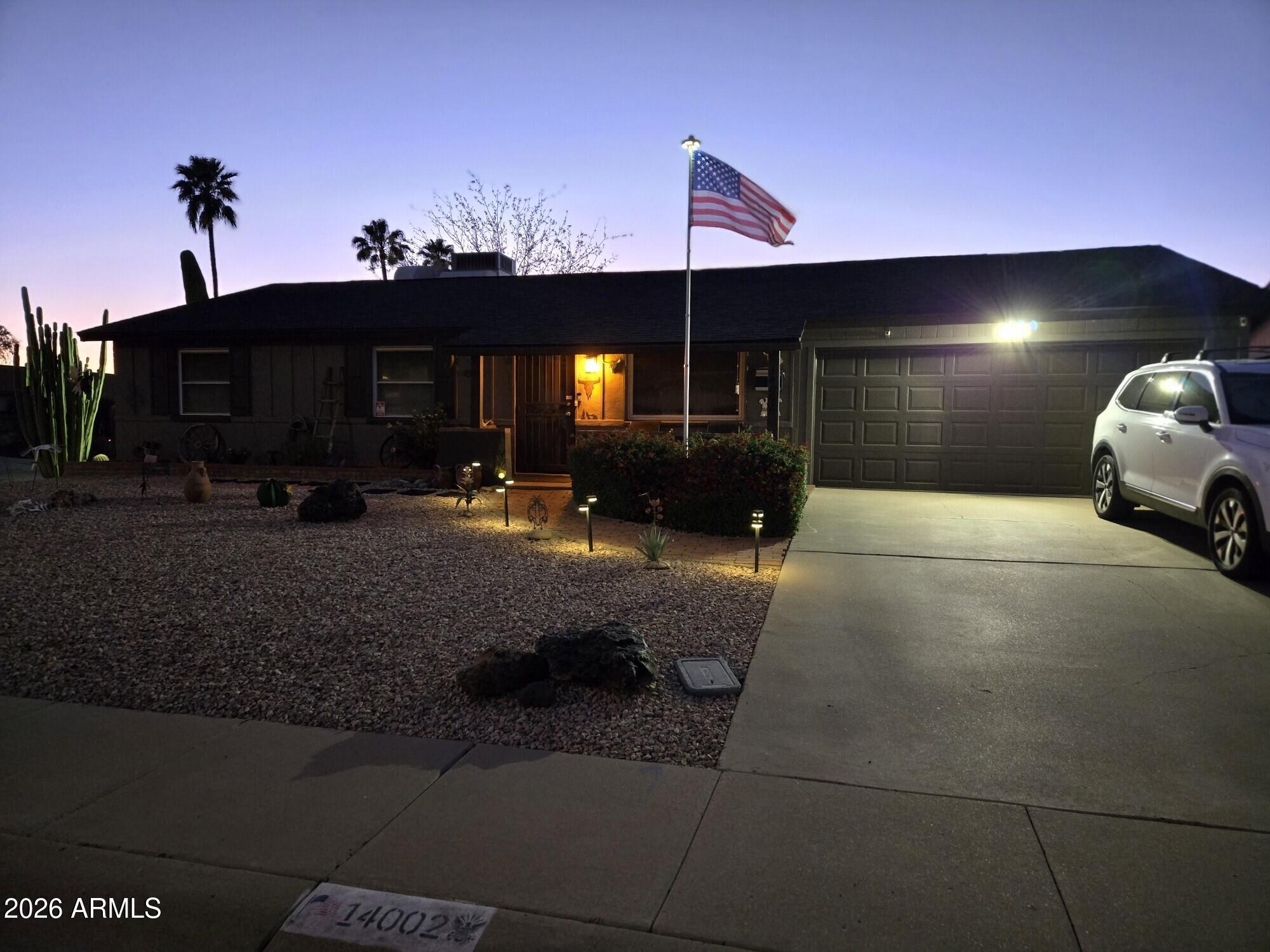 14002 North 37th Place Phoenix, AZ 85032 - Photo 33 of 33 a car parked in front of house