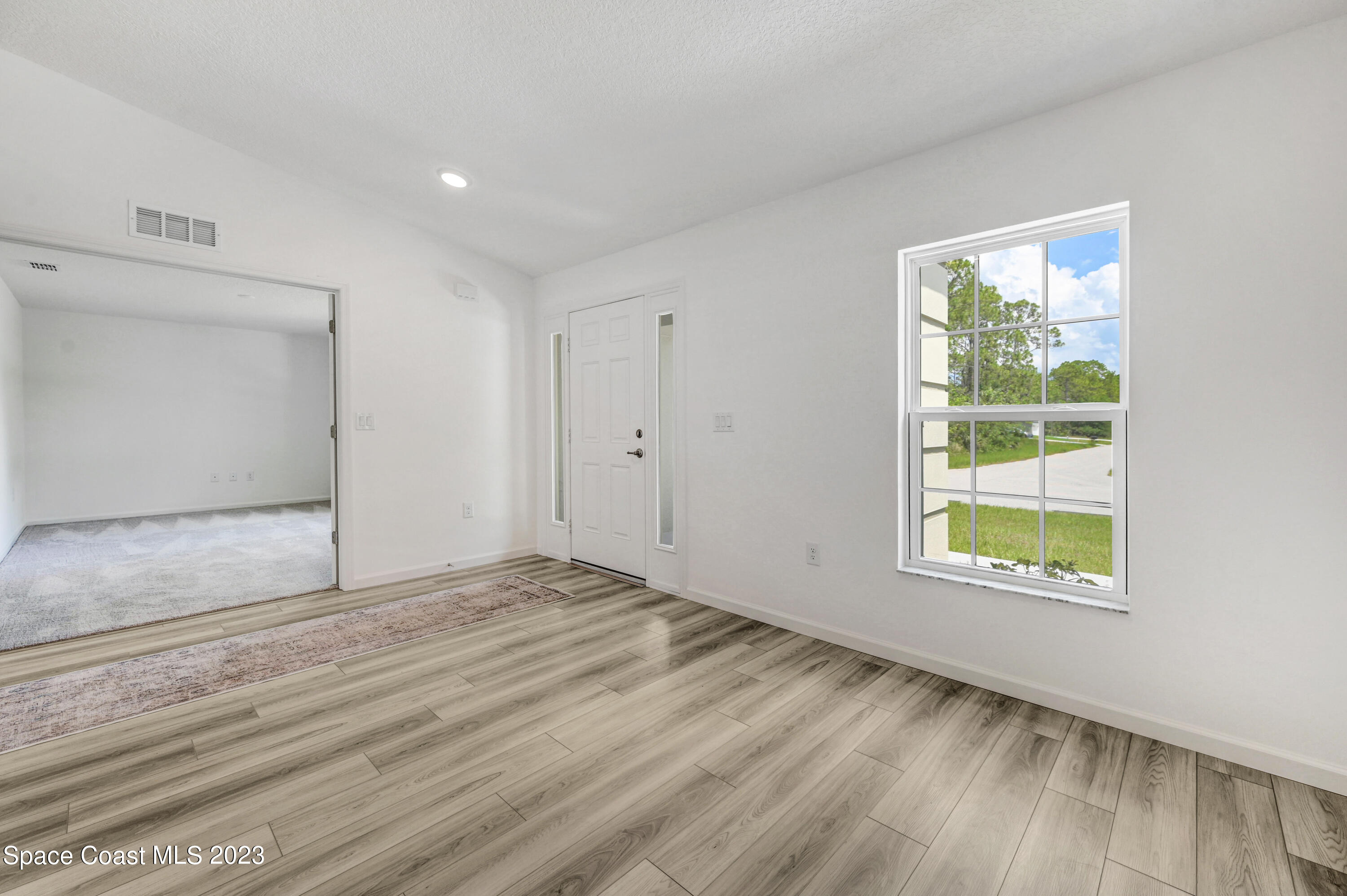 1018 Savery Road Palm Bay, FL 32908 - Photo 14 of 41 Entry from Dining