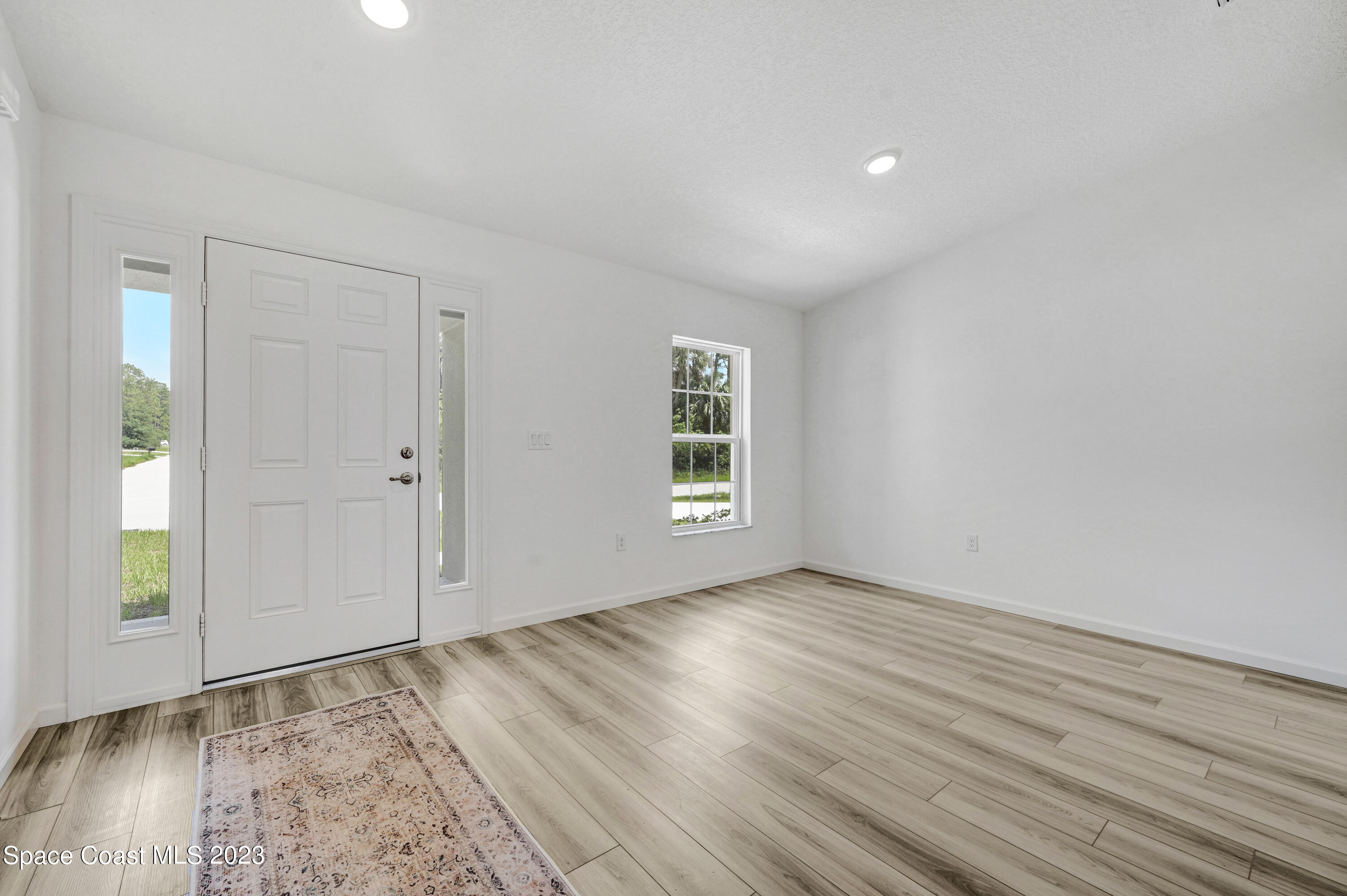 1018 Savery Road Palm Bay, FL 32908 - Photo 15 of 41 Entry and Dining