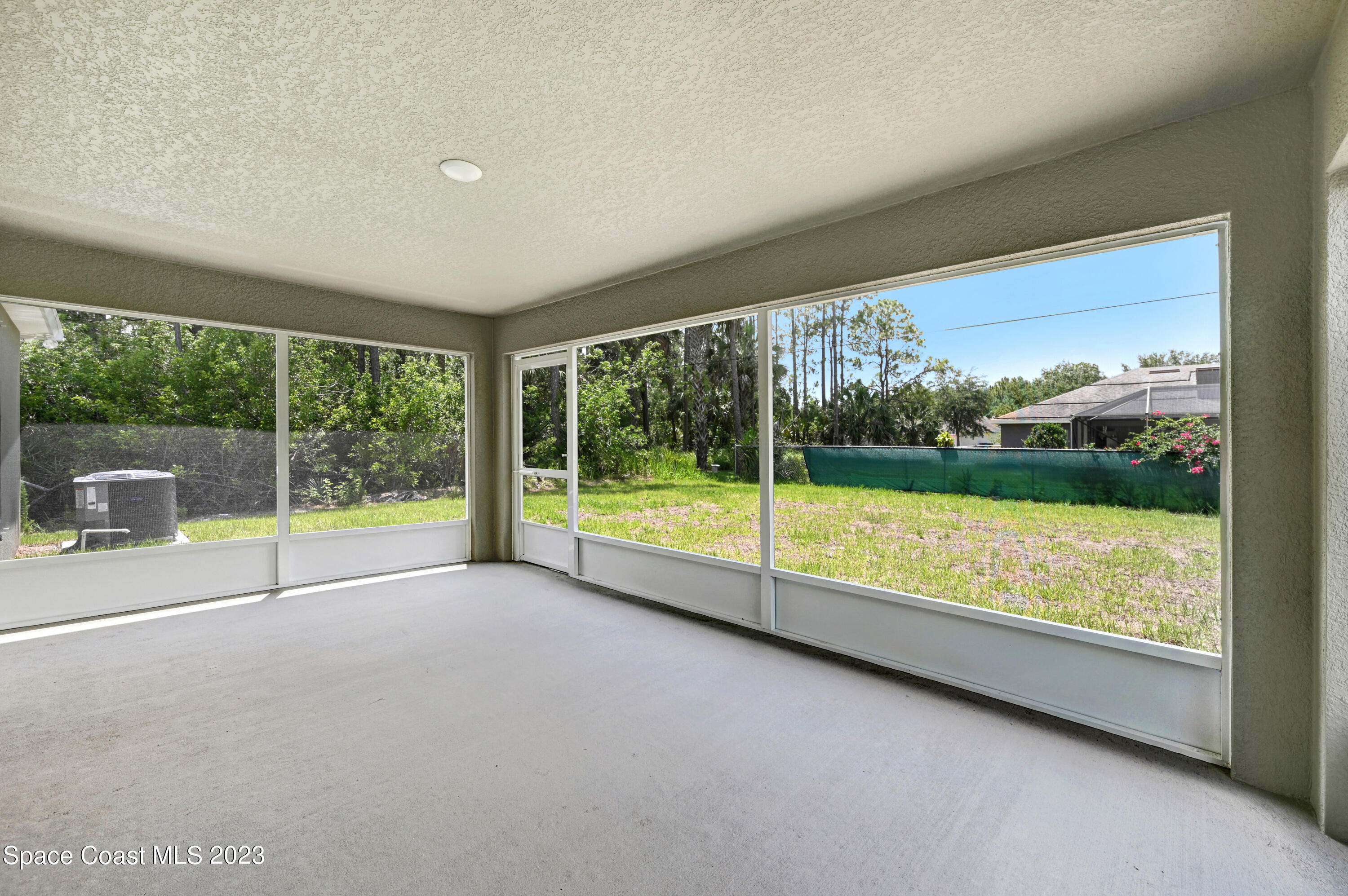 1018 Savery Road Palm Bay, FL 32908 - Photo 8 of 41 Trussed Screened Porch