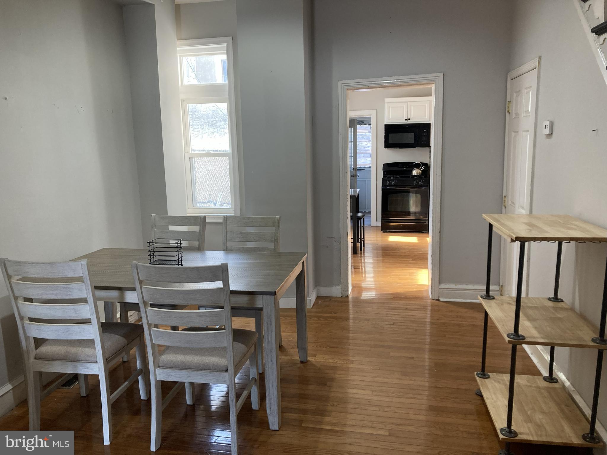 1304 Marlborough Street Philadelphia, PA 19125 - Photo 4 of 19 a view of a dining room with furniture and wooden floor