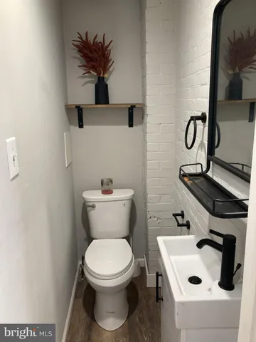 a front view of residential houses with stairs