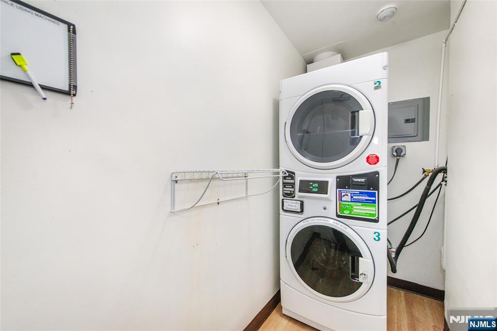265 Main Street, Unit 503 Ridgefield Park, NJ 07660 - Photo 19 of 23 a utility room with dryer and washer