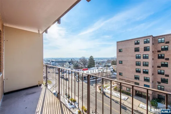 a view of balcony with furniture
