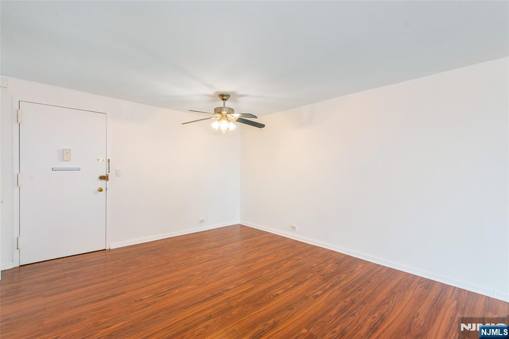 265 Main Street, Unit 503 Ridgefield Park, NJ 07660 - Photo 9 of 23 a view of empty room with wooden floor