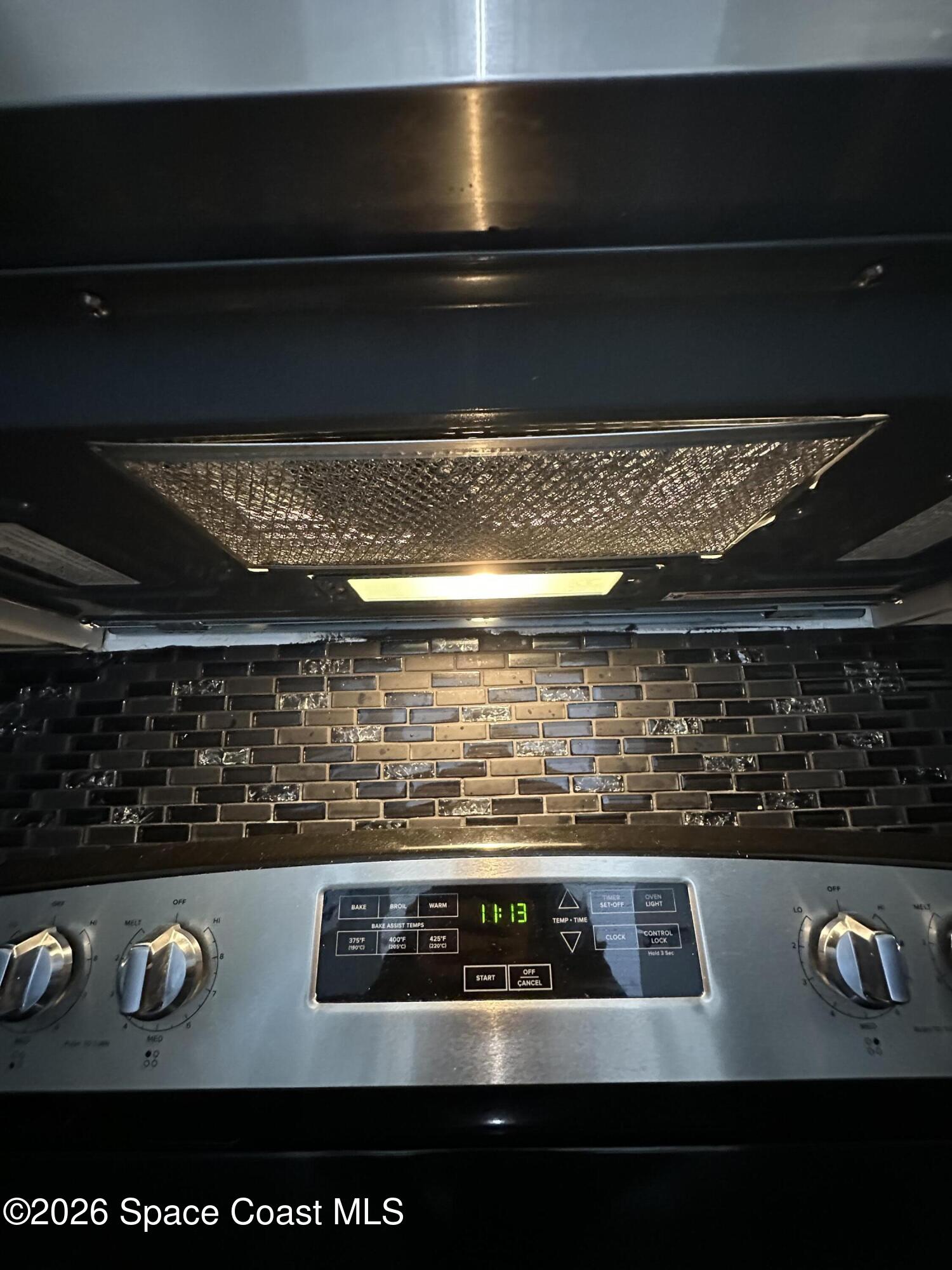 837 Hickory Street, Unit 3 Melbourne, FL 32901 - Photo 12 of 24 a close view of stove