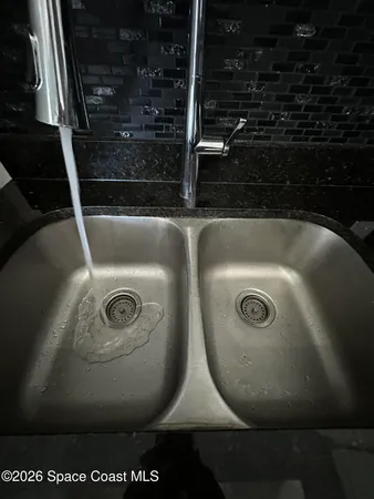 a view of hallway with windows