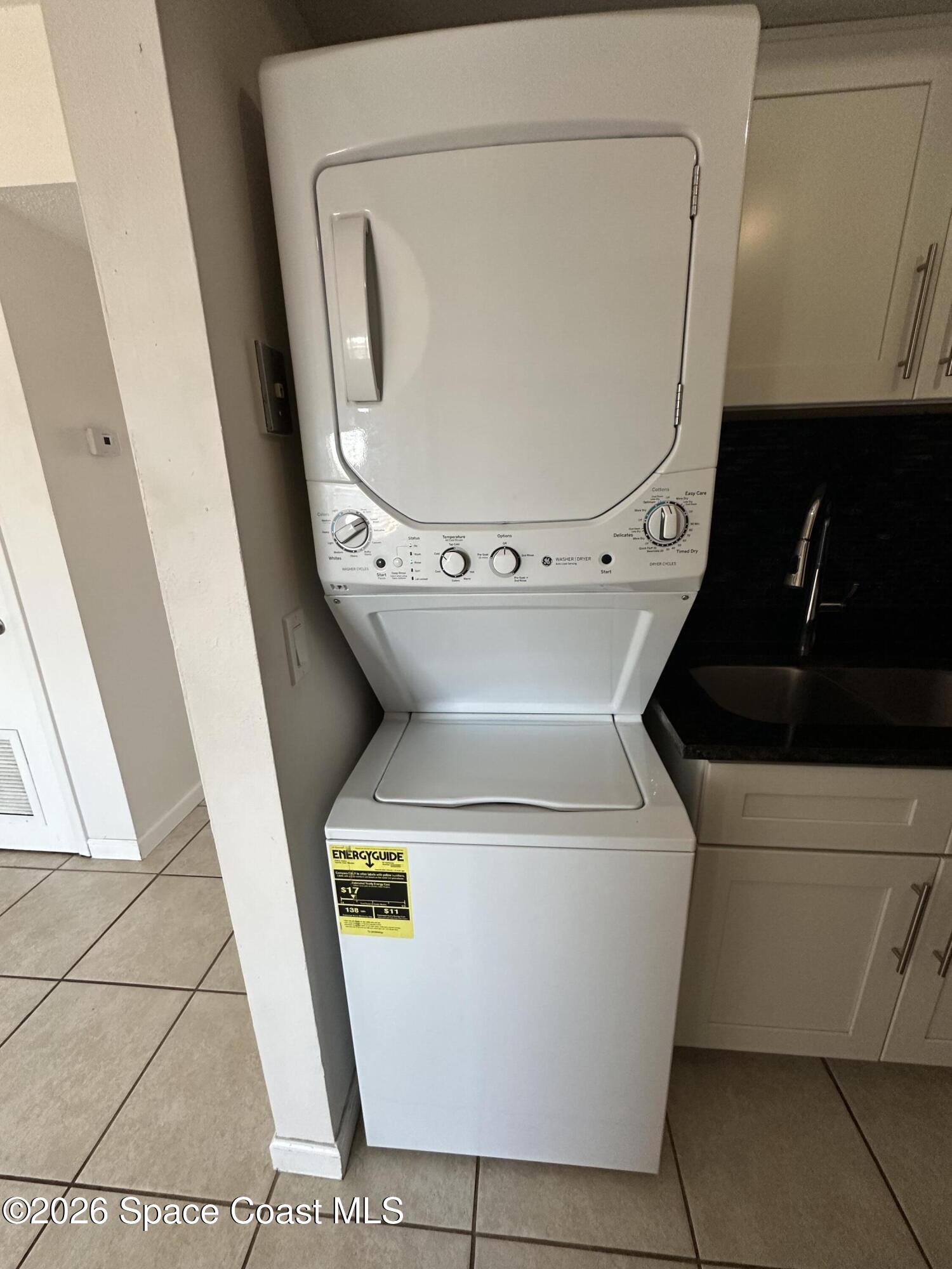 837 Hickory Street, Unit 3 Melbourne, FL 32901 - Photo 24 of 24 a close up view of washer and dryer