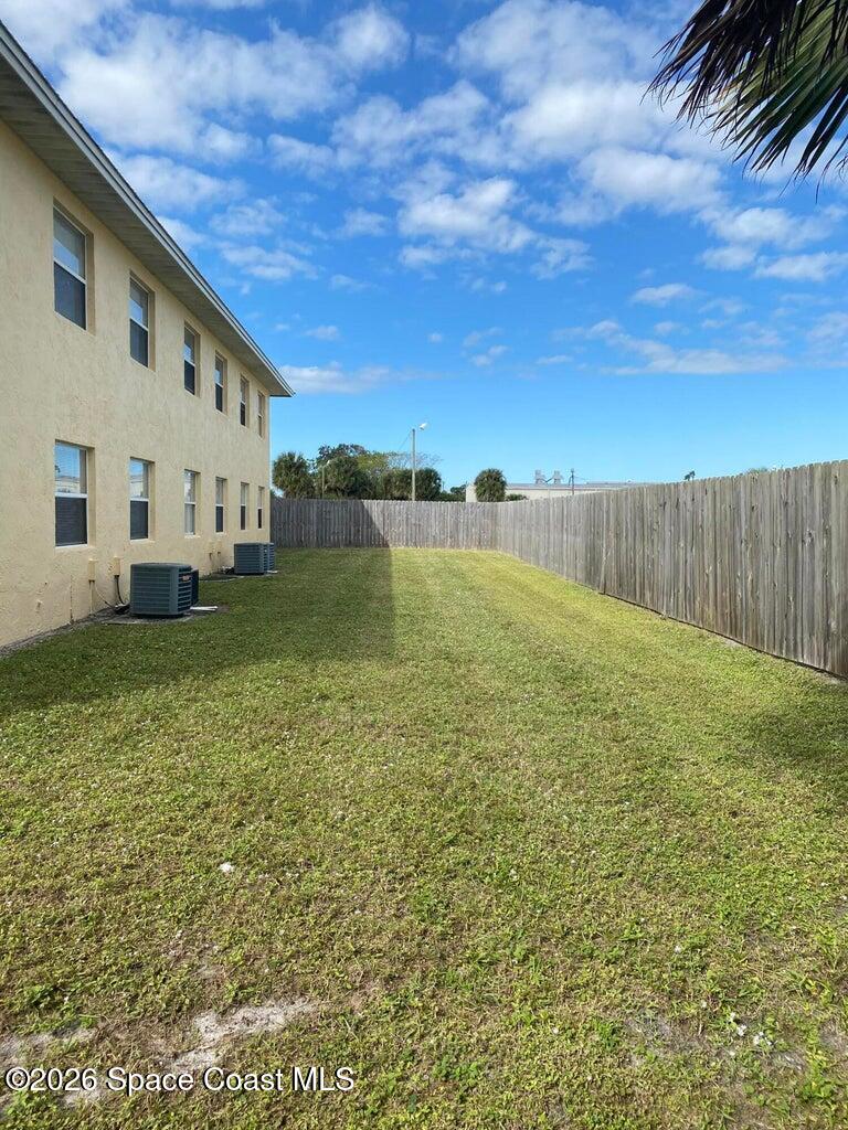 837 Hickory Street, Unit 3 Melbourne, FL 32901 - Photo 5 of 24 a view of a terrace with yard