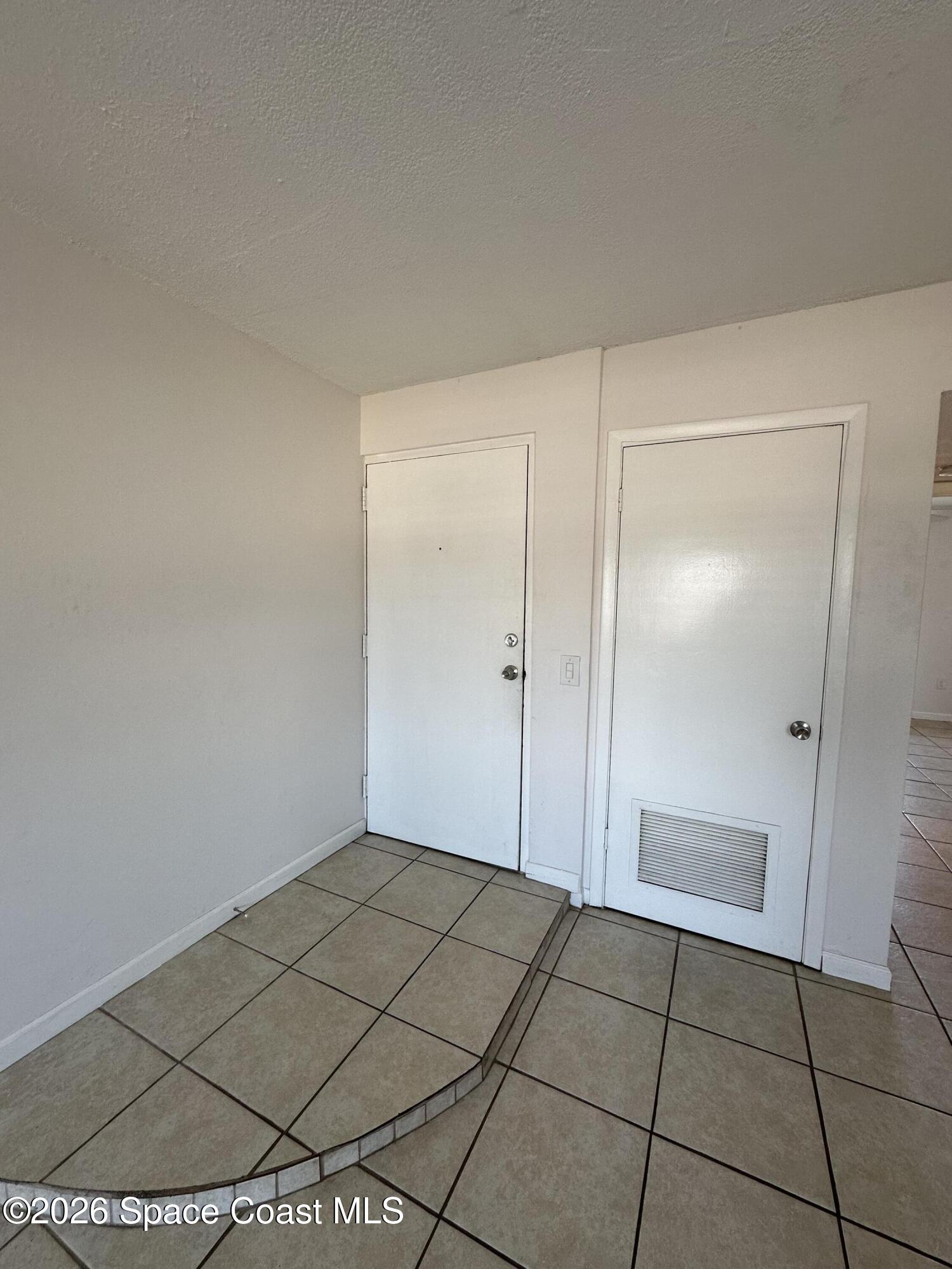 837 Hickory Street, Unit 3 Melbourne, FL 32901 - Photo 10 of 24 a view of an empty room