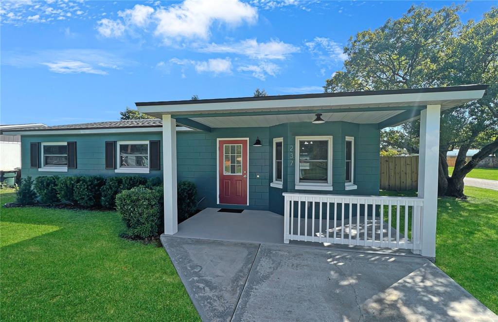 237 California Avenue St. Cloud, FL 34769 - Photo 1 of 1 front view of a house with a deck