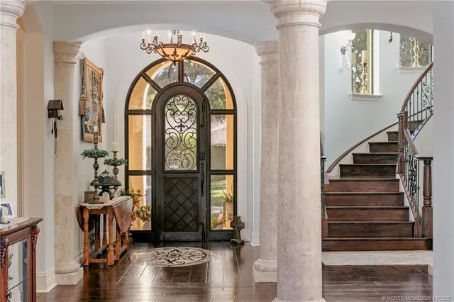 a dining hall with furniture window and wooden floor