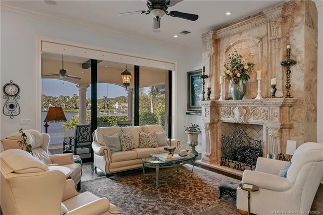 a kitchen with granite countertop a sink stove and cabinets