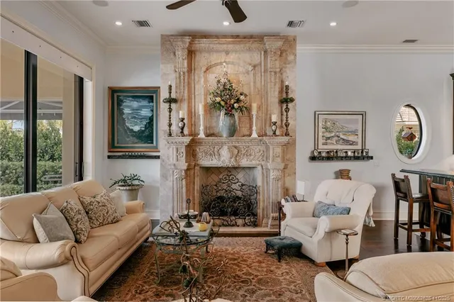 a large kitchen with a table and chairs