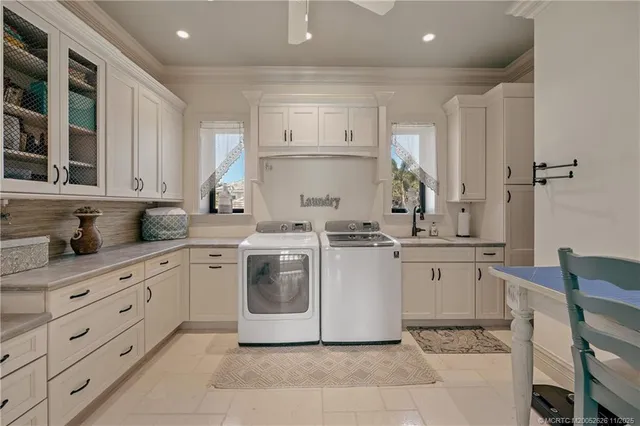 a bedroom with furniture and a large window