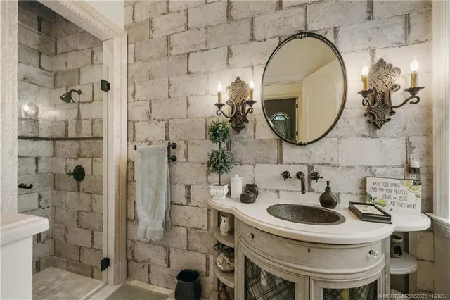 an aerial view of a house with a lake view