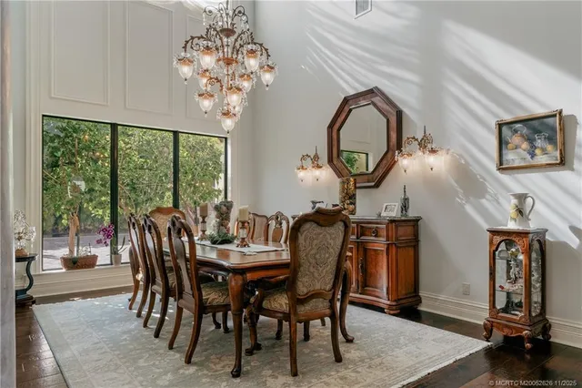 a view of an entryway and wooden floor